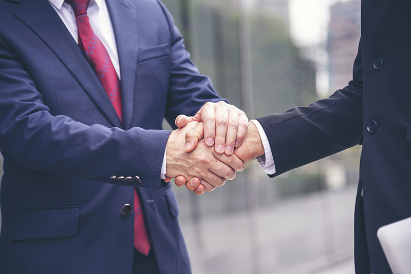 bigstock-Business-People-Shake-Hands-To-371829652.jpg