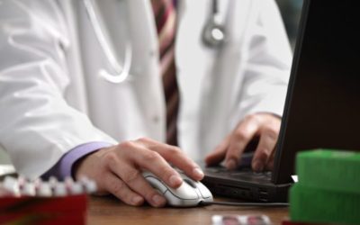Doctor Clicking Computer Mouse